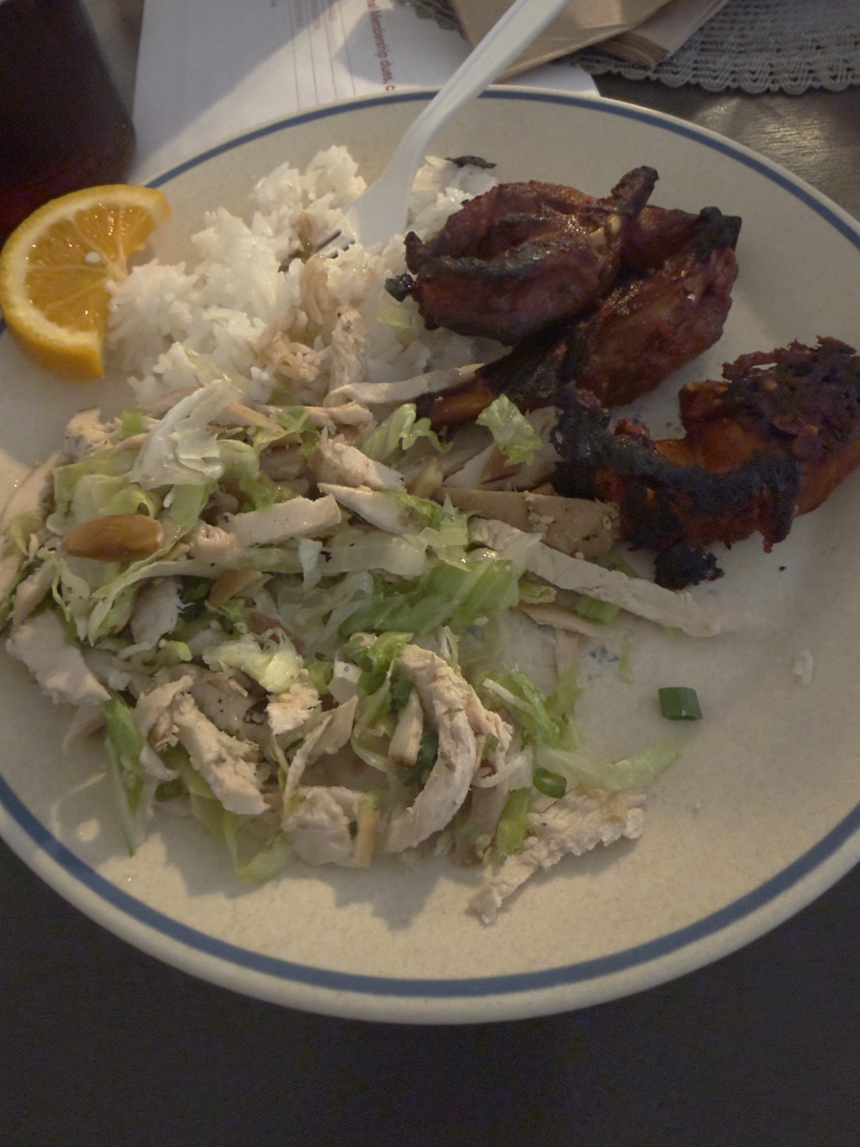 Dinner plate with rice, chicken salad and grilled chicken