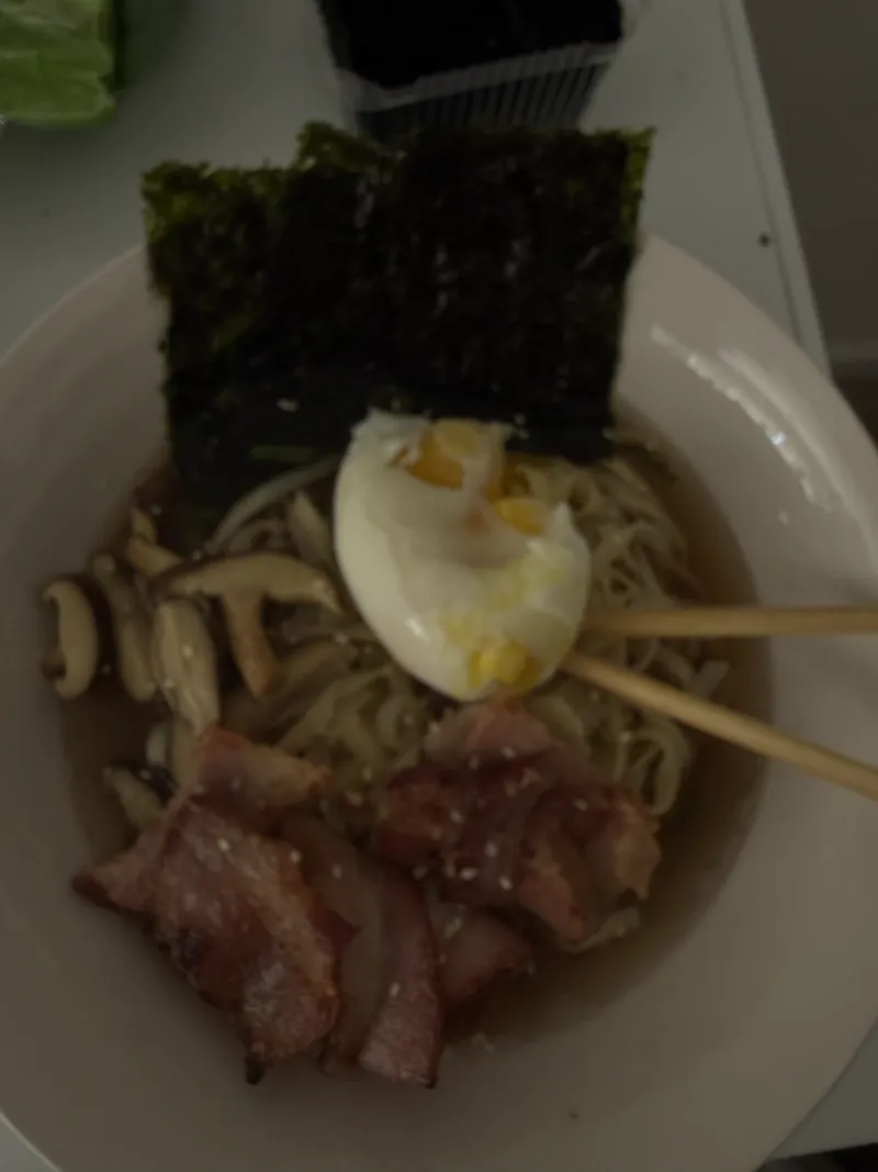 Homemade ramen with a soft egg, nori, mushrooms and meat