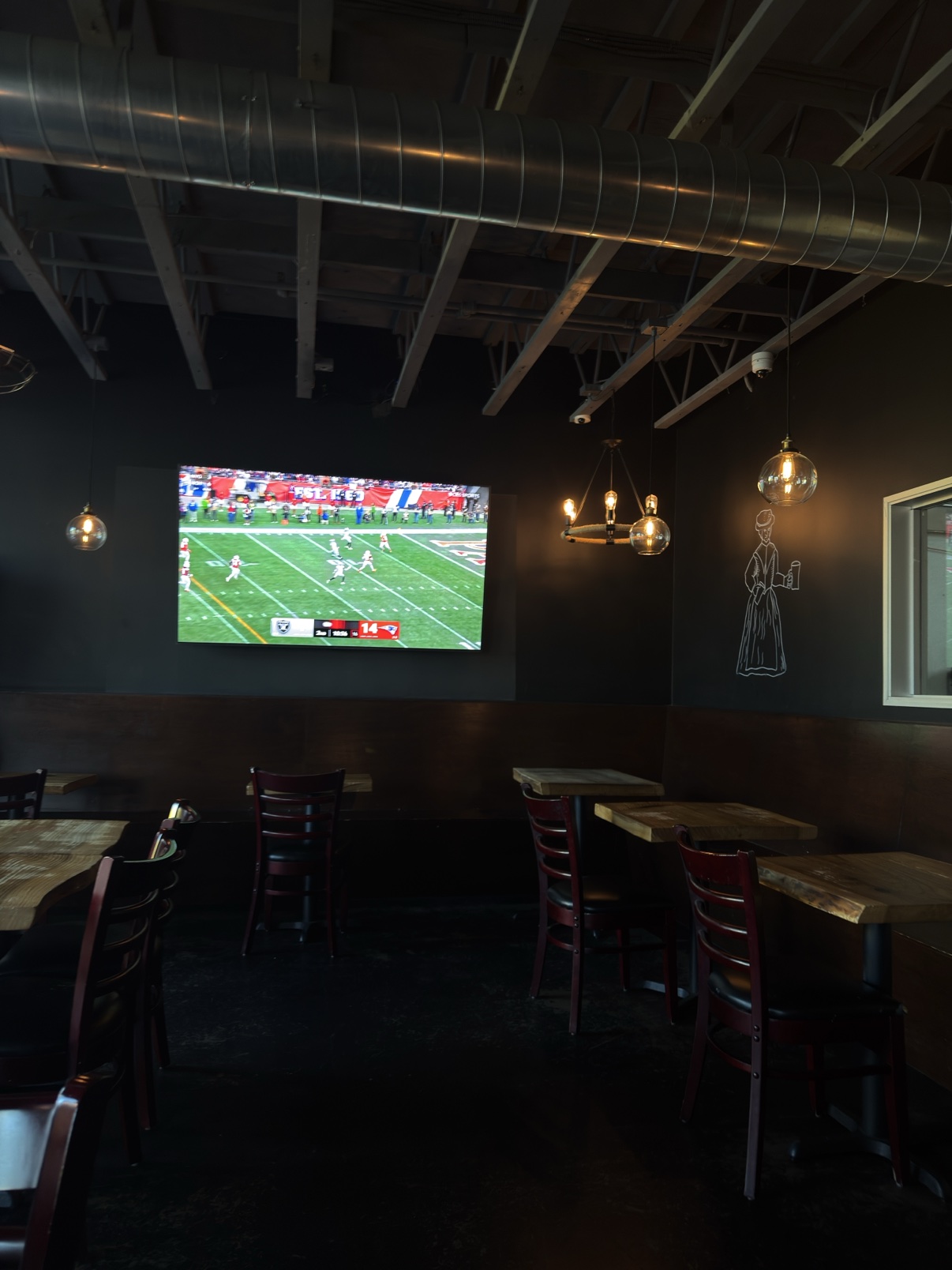 The taproom at my local brewery, the Patriots game on the big screen, globe lights hanging over the tables