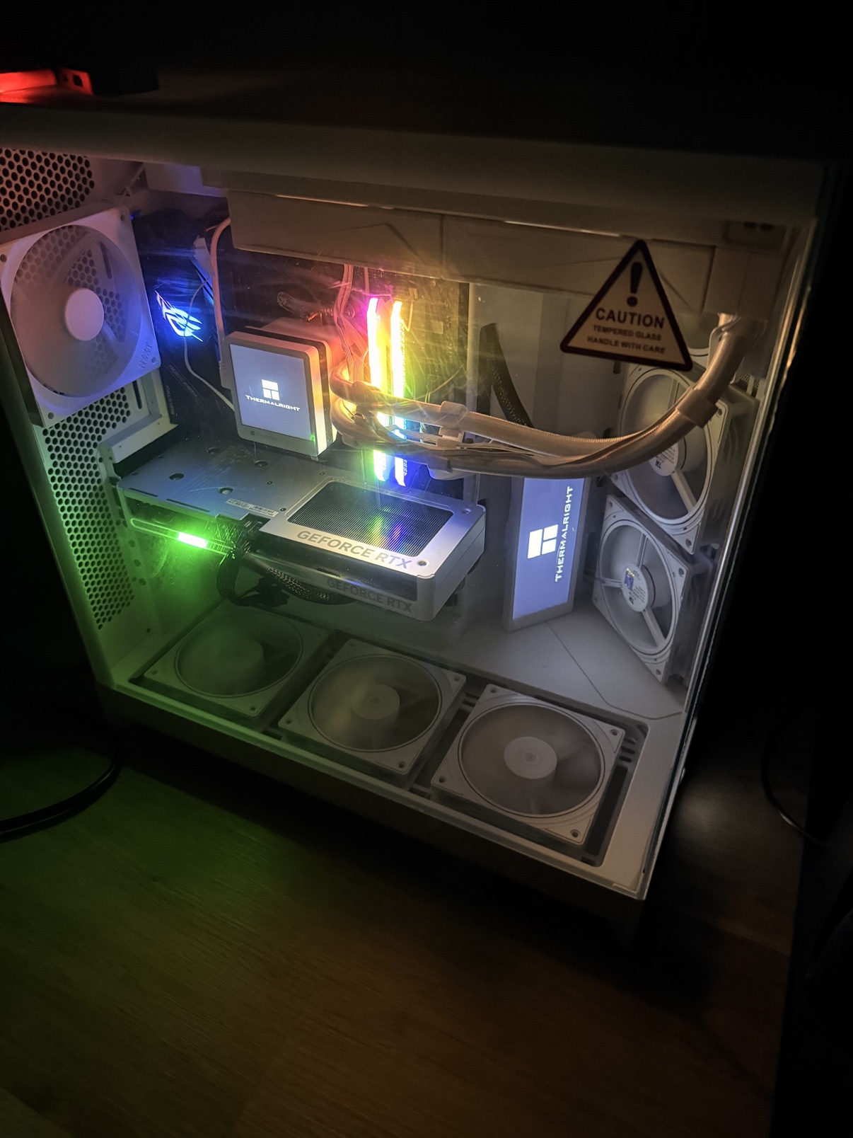 My gaming PC — white NZXT H9 Flow case with RGB lighting and a GeForce RTX graphics card