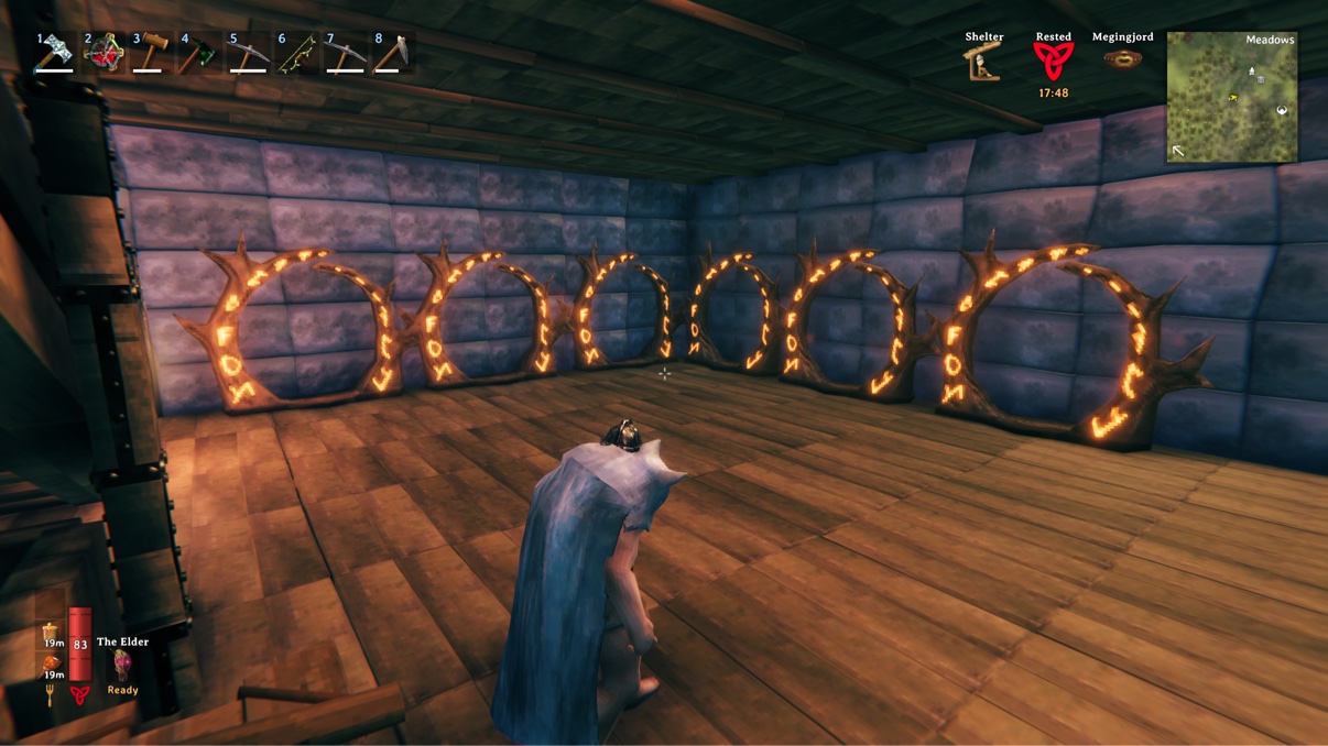 A row of glowing portals inside our Valheim base